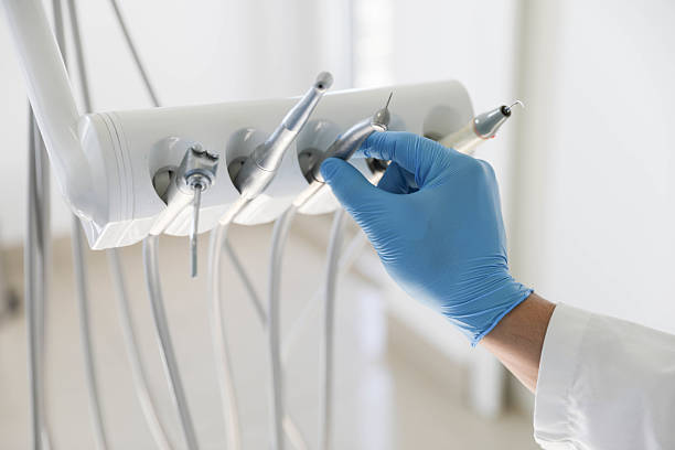 Professional Root Canal Treatment technician working in Lawrence, IN